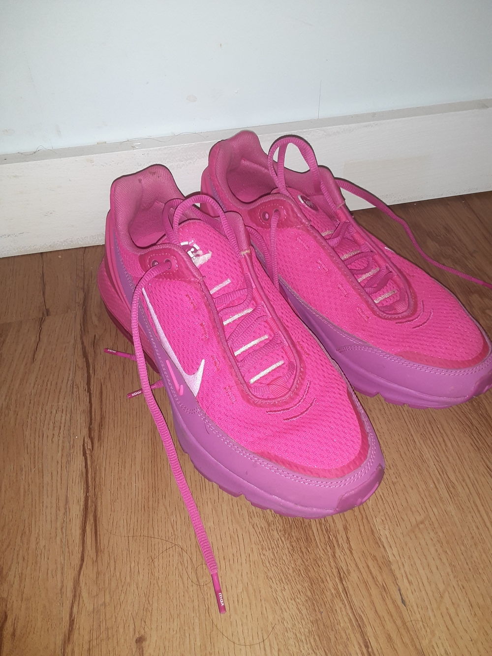Nike Women’s Hot Pink Mesh Athletic Sneakers with White Swoosh